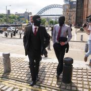 Daniel Graham (centre) and Adam Carruthers (right) leaving Newcastle Upon Tyne Magistrates' Court