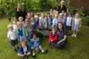 LITTLE HELPERS: The pupils played their part in creating the vets' special wellbeing garden Picture: Jonathan Becker