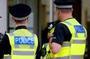 A woman has been arrested on suspicion of racially aggravated assault
