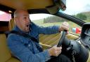 Paddy McGuinness at the wheel of Lamborghini – moments before crashing it in a trailer for the new series (BBC/PA)