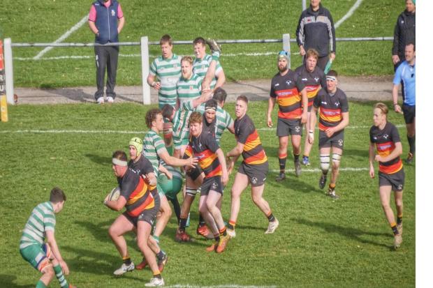 RUGBY: George Oyston makes valuable yards for Kirkby backed up by Stu Story with Archie Carr leading more support (Pictures by Robin Ree)