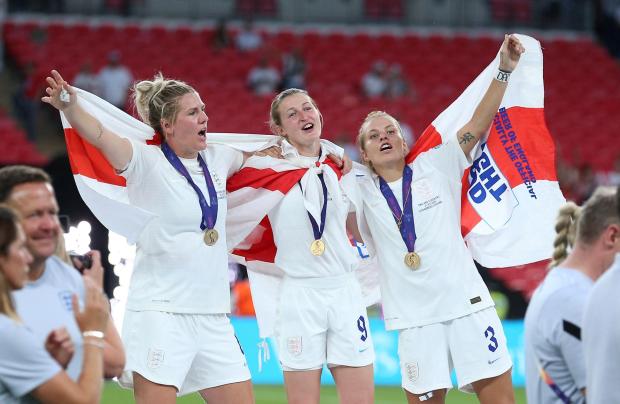 Cumberland & Westmorland Gazette: Millie Bright, Ellen White and Rachel Daly celebrate victory over Germany. Credit: Nigel French/PA