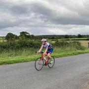 Pedal power: Robbie Tuer from Raughton Head Young Farmers, who is doing a charity cycle