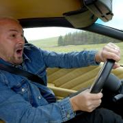 Paddy McGuinness at the wheel of Lamborghini – moments before crashing it in a trailer for the new series (BBC/PA)