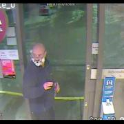 KILLER: Paul Robson at a Shell petrol station in Cumbria after the death of his ex-partner Caroline Kayll
