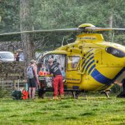 EMERGENCY: The casualty is placed into an air ambulance. Picture: Robin Ree