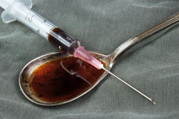 Cumberland & Westmorland Gazette: GENERIC PICTURE --- Drug syringe and cooked heroin on spoon